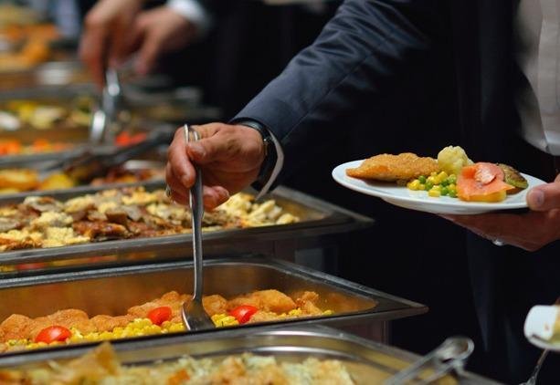 Employee Happy Hour and staff meal catering spread by Mama Chizzy's